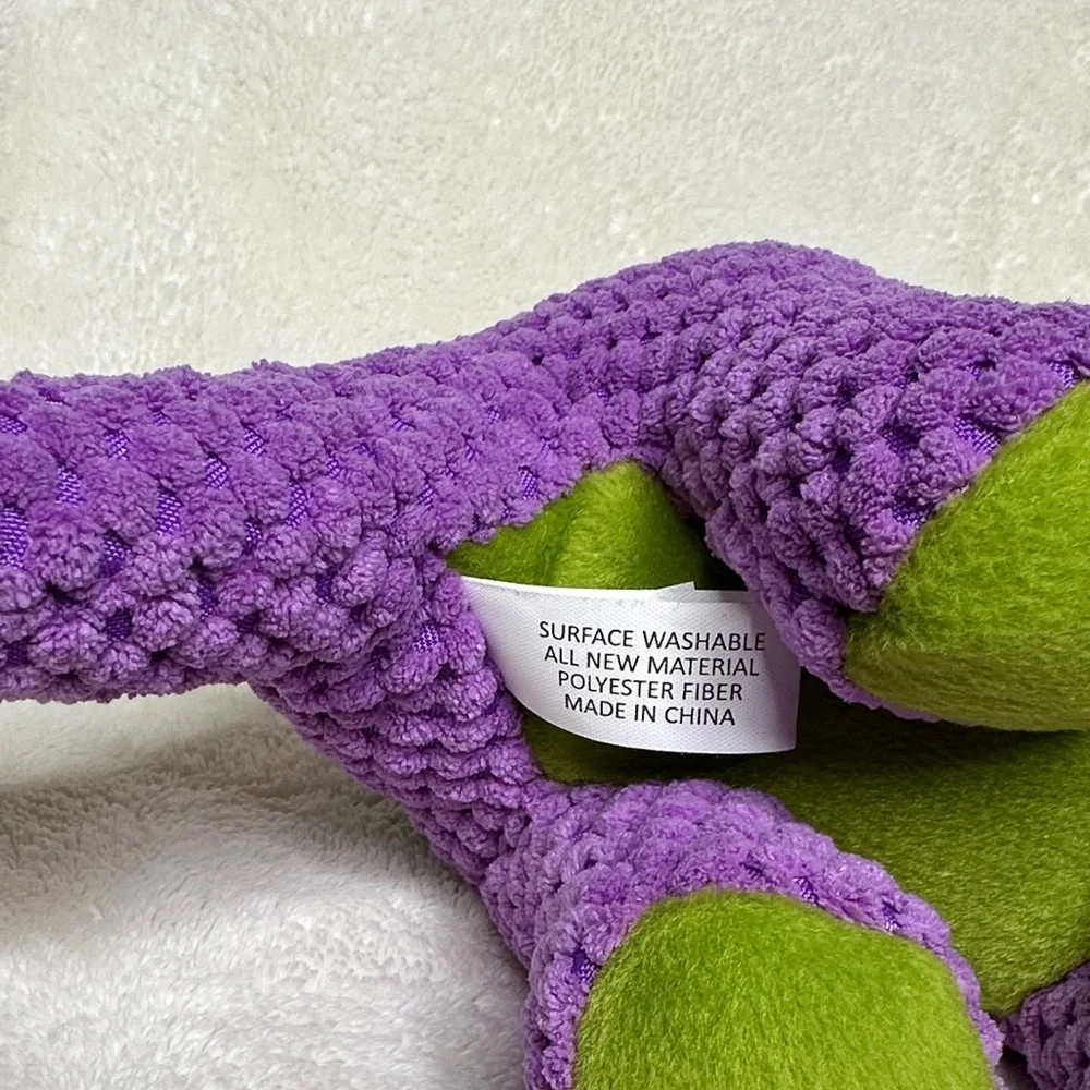 GoDog Bruto Purple Dinosaur Plush Dog Toy Silent Squeaker Chew Guard
